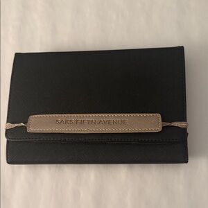 Saks Fifth Avenue Black and Gold travel case for passport, phone etc.